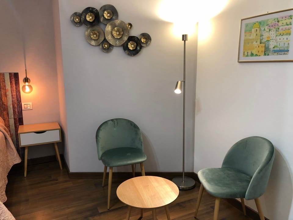 Double Room | Minibar, desk, iron/ironing board, rollaway beds