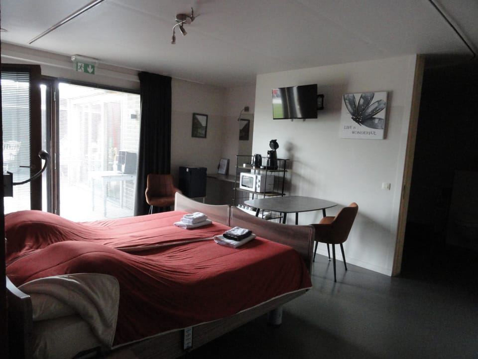 Family Quadruple Room, Garden Area | In-room safe, desk, soundproofing, free WiFi