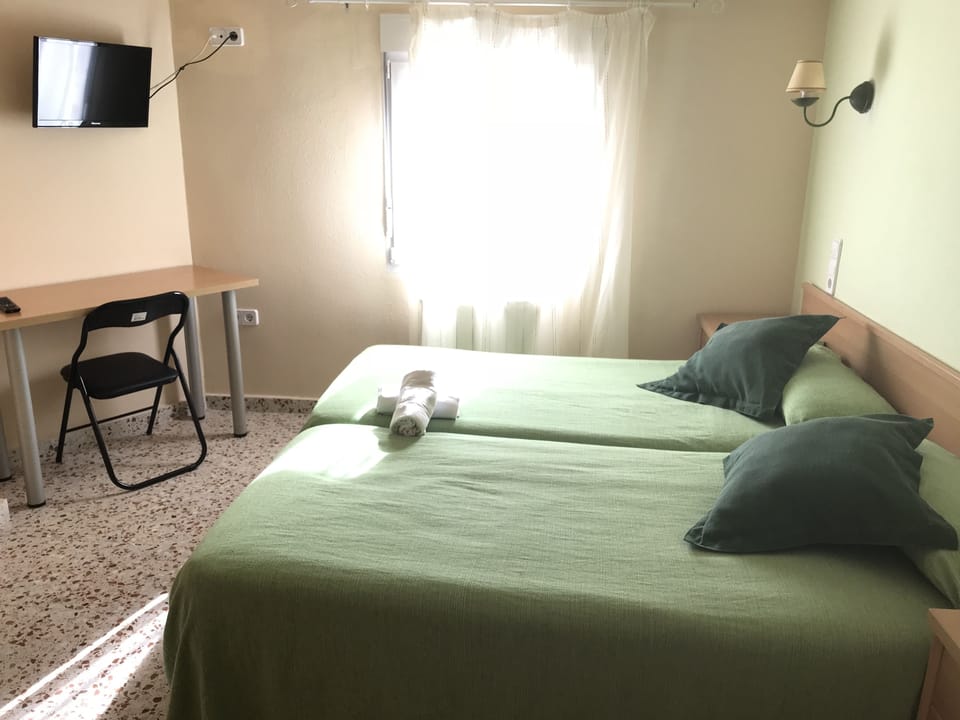 Double or Twin Room | Desk, free cribs/infant beds, free WiFi, bed sheets