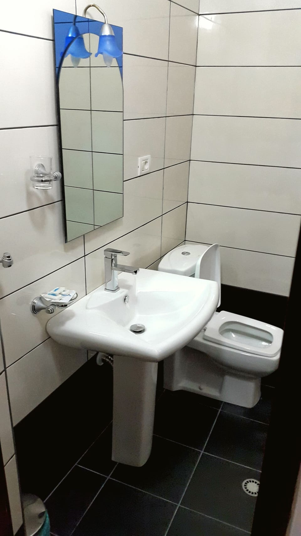 Shower, free toiletries, hair dryer, slippers