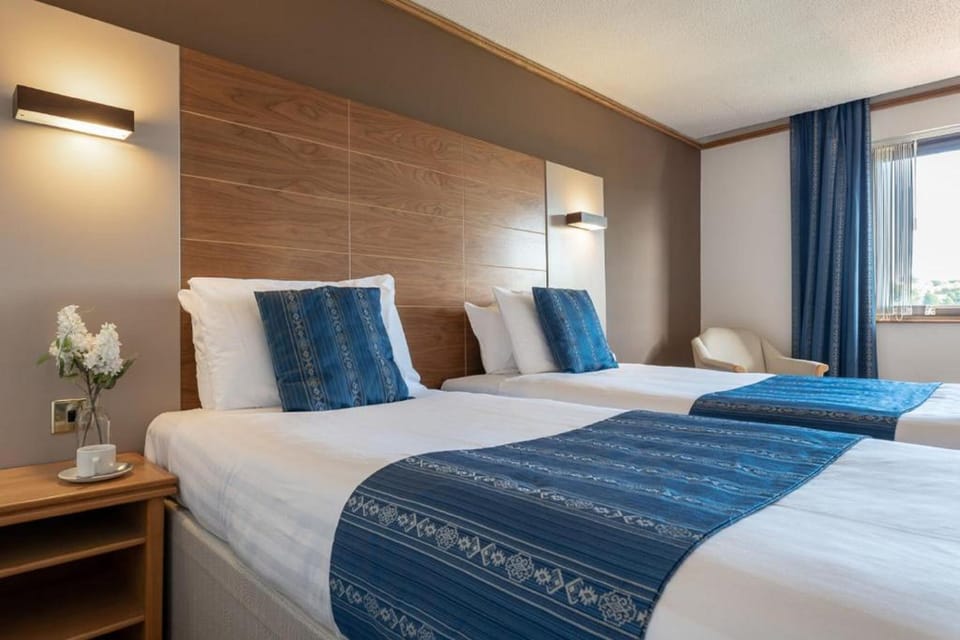 Standard Twin Room | Desk, blackout drapes, iron/ironing board, free WiFi