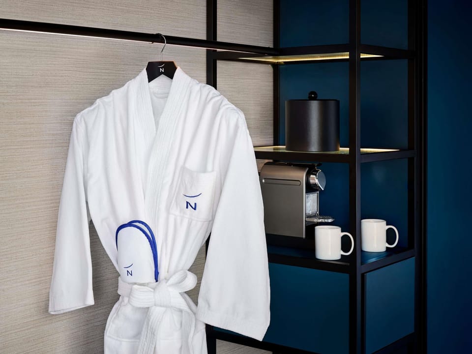 Down comforters, pillowtop beds, in-room safe, desk