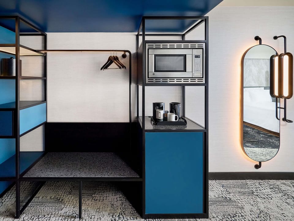 Down comforters, pillowtop beds, in-room safe, desk