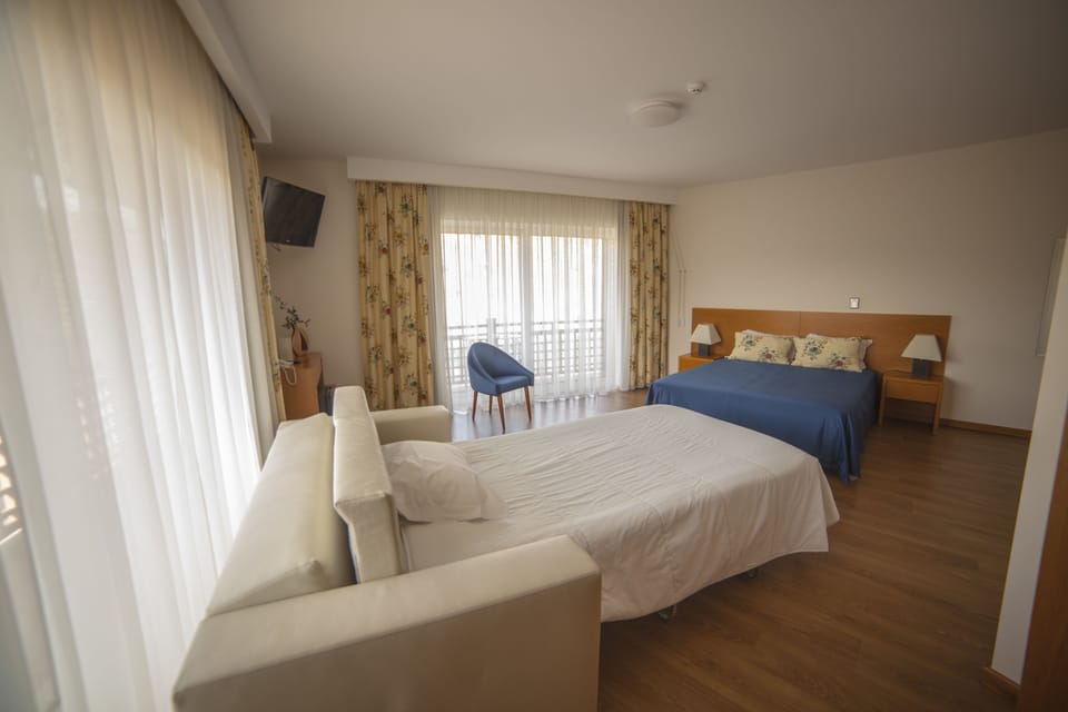 Family Room, River View | Minibar, desk, soundproofing, rollaway beds
