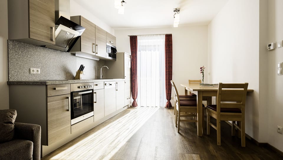 Apartment, 2 Bedrooms | Living area | Flat-screen TV