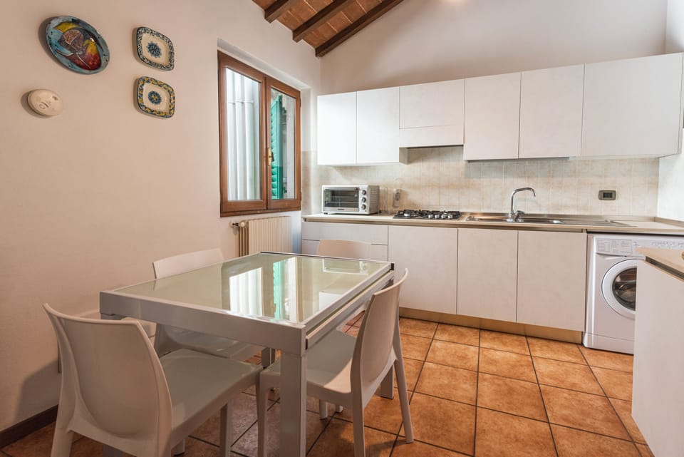Comfort Apartment, 2 Bedrooms | Private kitchen | Full-size fridge, microwave, oven, stovetop