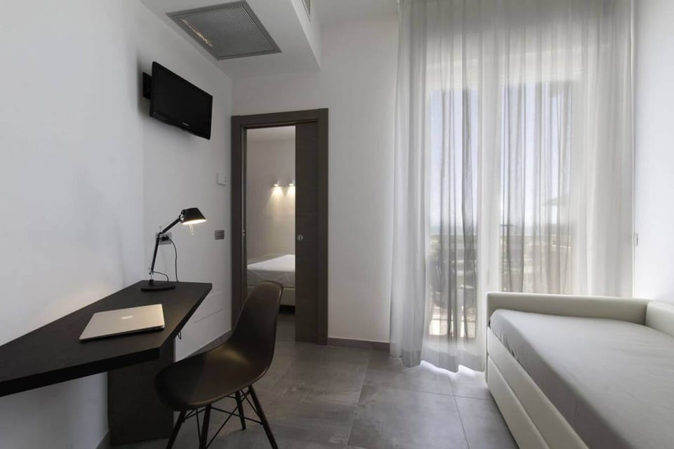 Quadruple Room, 2 Bedrooms | Minibar, in-room safe, desk, WiFi (free)