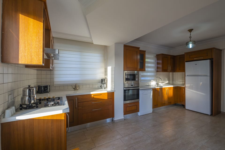 Luxury Villa, 4 Bedrooms | Private kitchen | Coffee/tea maker, full-size fridge, microwave, oven