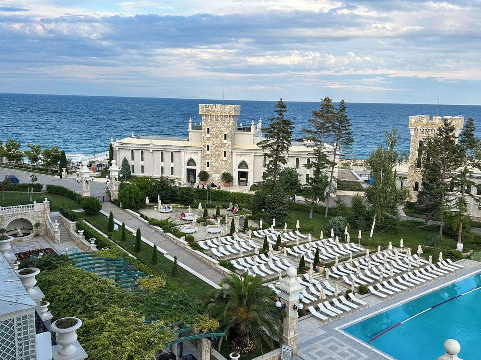 Deluxe Double Room, Sea View | Minibar, in-room safe, desk, laptop workspace