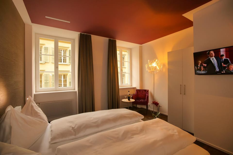 Egyptian cotton sheets, premium bedding, down comforters, in-room safe