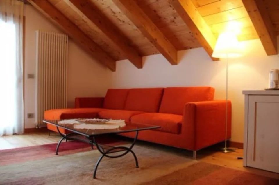 Suite, 1 King Bed, Jetted Tub, Mountain View | Living area | 26-inch flat-screen TV with satellite channels, TV