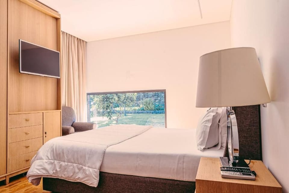 Double Room, Garden View | Desk, soundproofing, rollaway beds, bed sheets