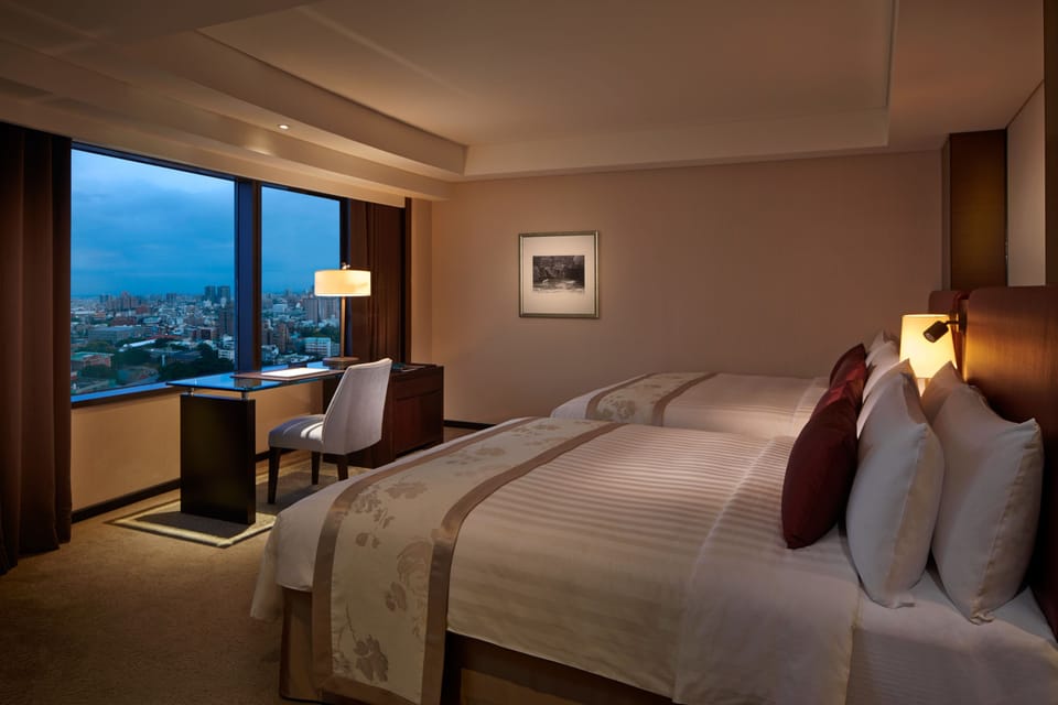 Premium bedding, down comforters, pillowtop beds, in-room safe
