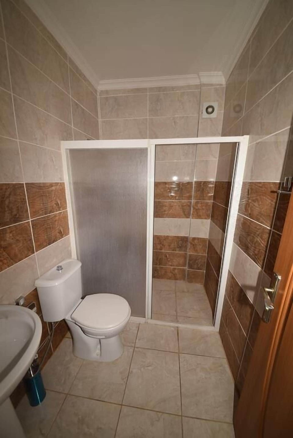 Shower, hair dryer, slippers, towels