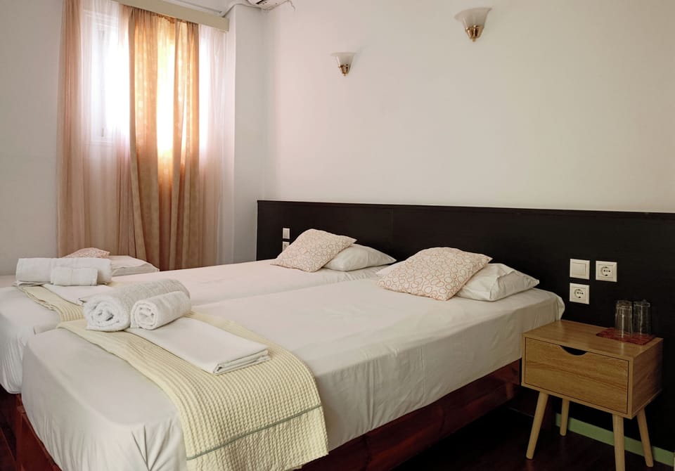 Basic Triple Room | Minibar, desk, iron/ironing board, free WiFi