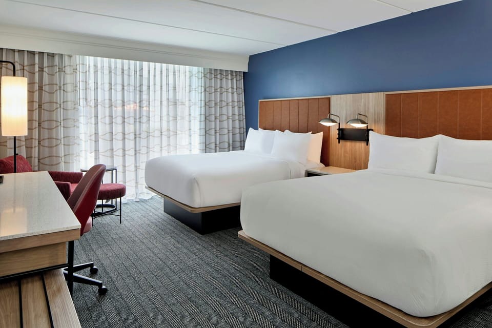 Room, 2 Queen Beds | In-room safe, desk, iron/ironing board, WiFi (free)