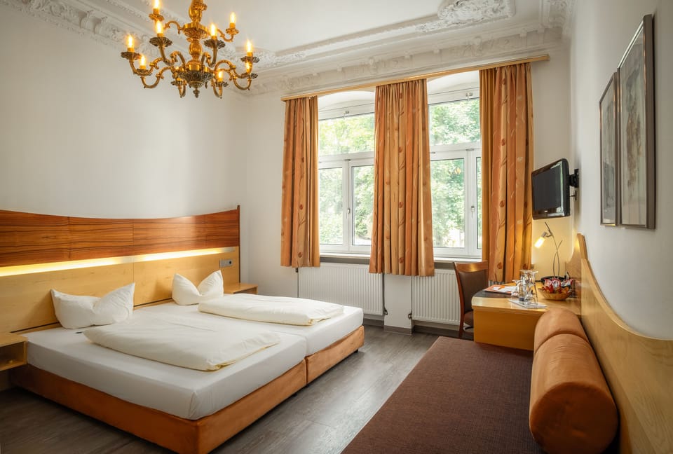 Standard Double Room | Minibar, in-room safe, individually furnished, desk