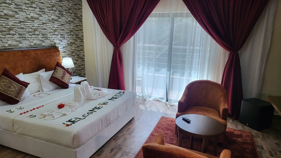 Deluxe Double or Twin Room | Minibar, in-room safe, desk, laptop workspace