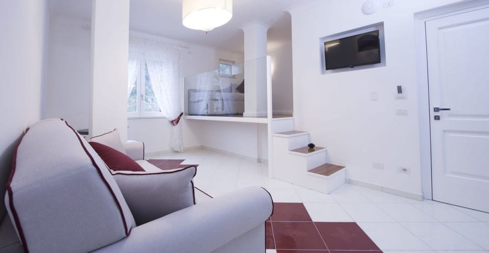 Family Room | 1 bedroom, premium bedding, minibar, in-room safe