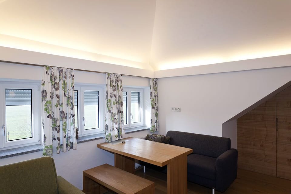 Single Room, Garden View | Living area | Flat-screen TV