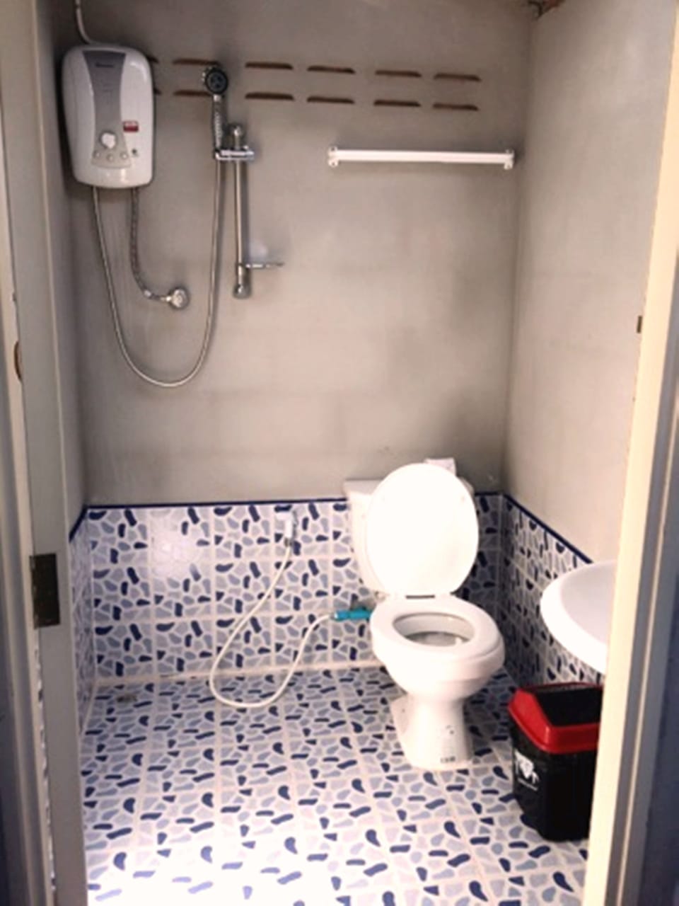 Modern Bungalow with Fan (Private Bathroom) | Bathroom | Shower, rainfall showerhead, towels, soap