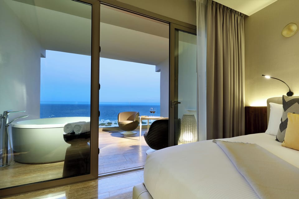 Free minibar, in-room safe, desk, blackout drapes