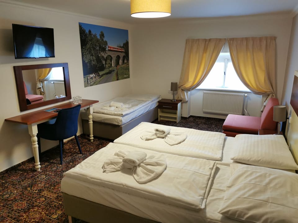 Desk, blackout drapes, iron/ironing board, free WiFi