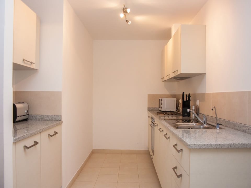 Apartment, 2 Bedrooms | Private kitchenette | Full-size fridge, microwave, oven, stovetop