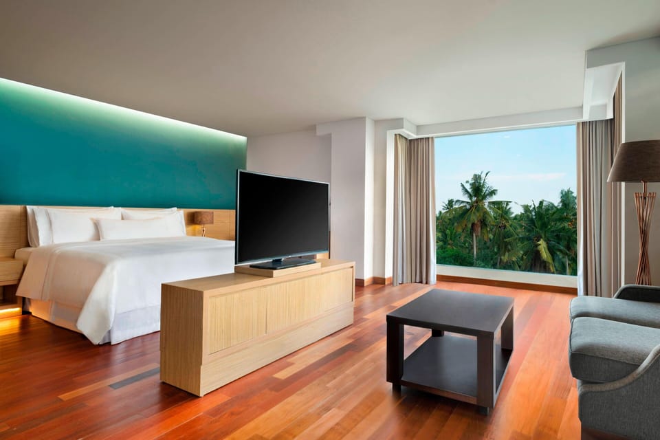 Suite, 1 Bedroom, Balcony, Garden View | Premium bedding, in-room safe, desk, blackout drapes