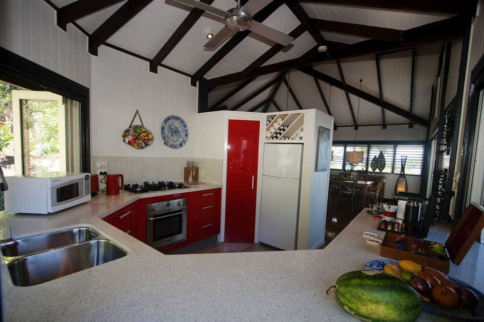 Exclusive House, 1 Bedroom, Ocean View, Beachfront | Private kitchen | Full-size fridge, microwave, oven, stovetop