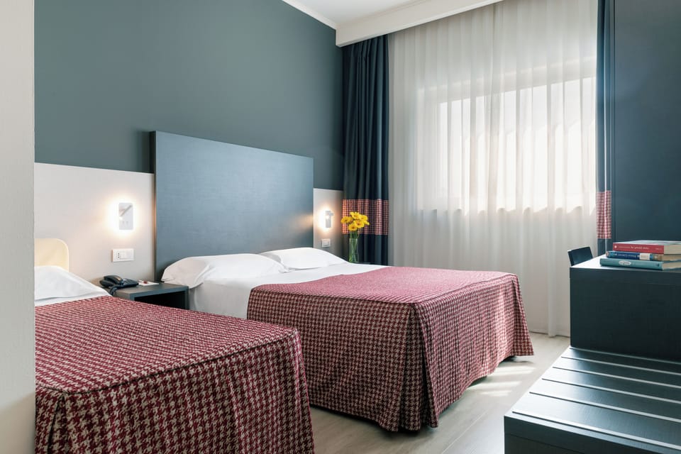 Superior Double or Twin Room | Down comforters, minibar, in-room safe, desk
