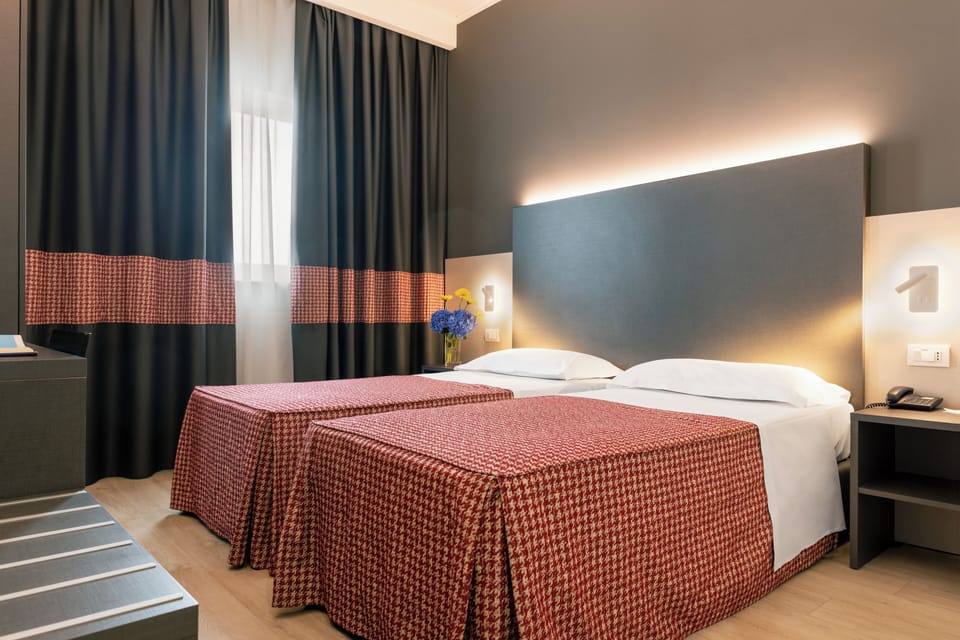 Superior Double or Twin Room | Down comforters, minibar, in-room safe, desk