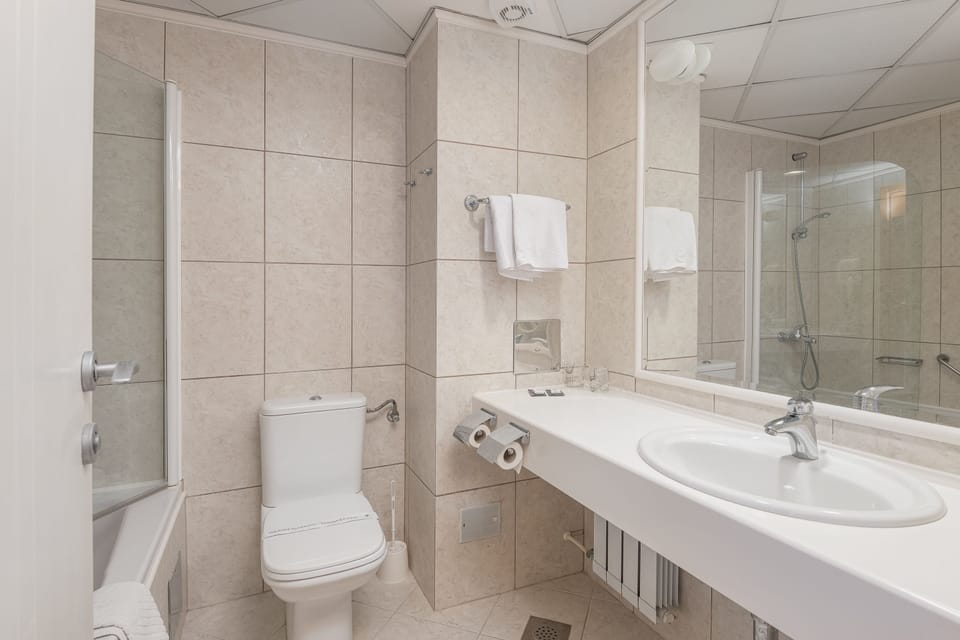 Bathtub, deep soaking tub, free toiletries, hair dryer