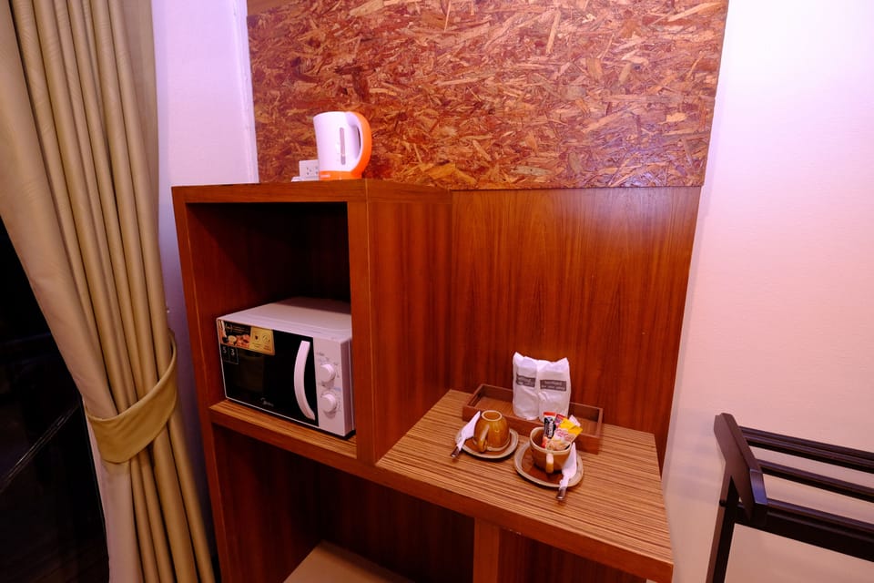 Minibar, in-room safe, blackout drapes, free WiFi