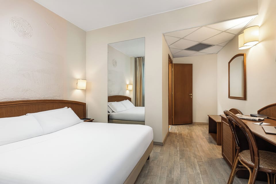 Premium bedding, down comforters, Select Comfort beds, minibar