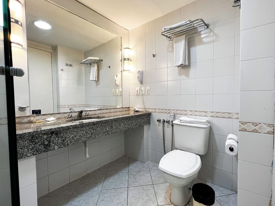 Standard Room (Familia) | Bathroom | Shower, hair dryer, towels, soap