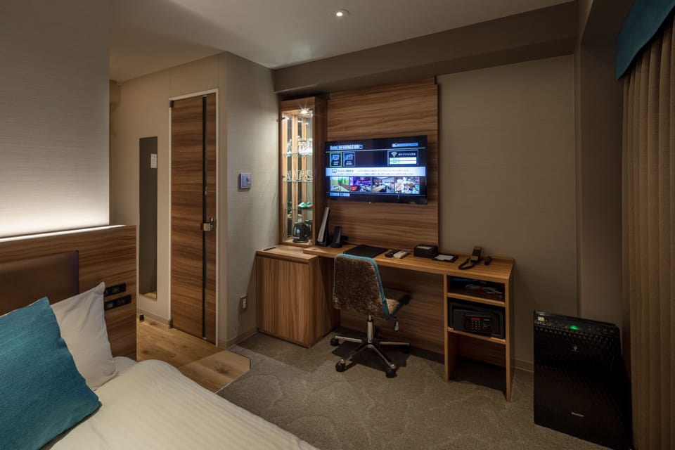 Economy Double Room A | Minibar, in-room safe, blackout drapes, free WiFi