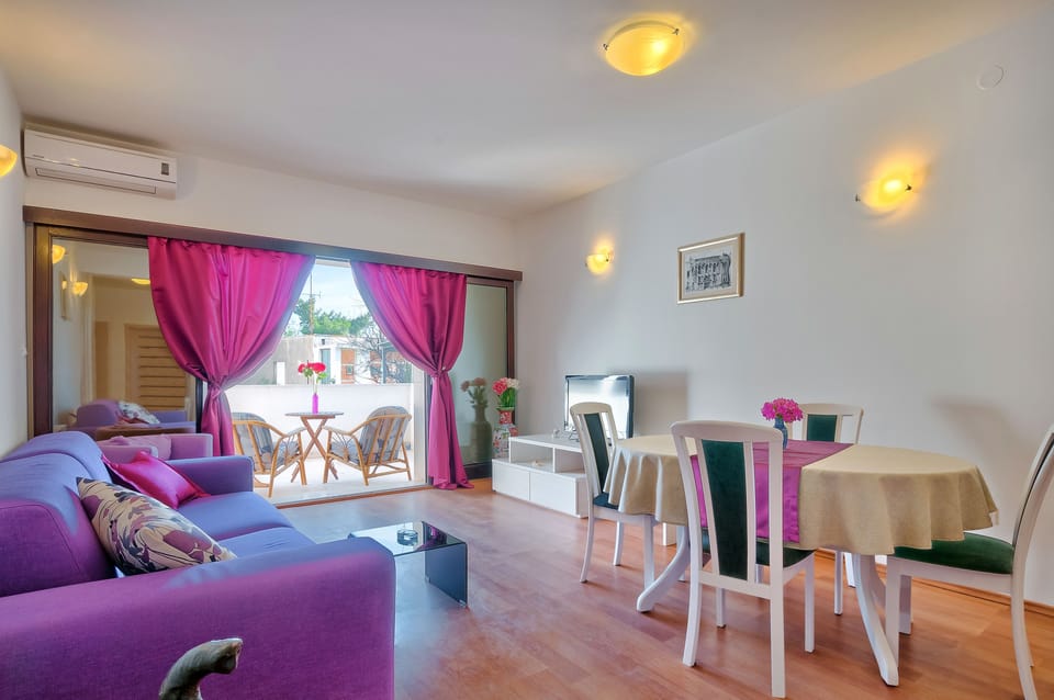 Apartment, 1 Bedroom, Pool View | Living area | Smart TV