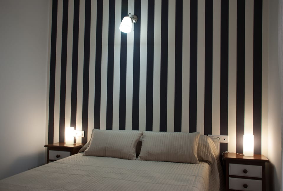Double Room | Desk, blackout drapes, iron/ironing board, free WiFi