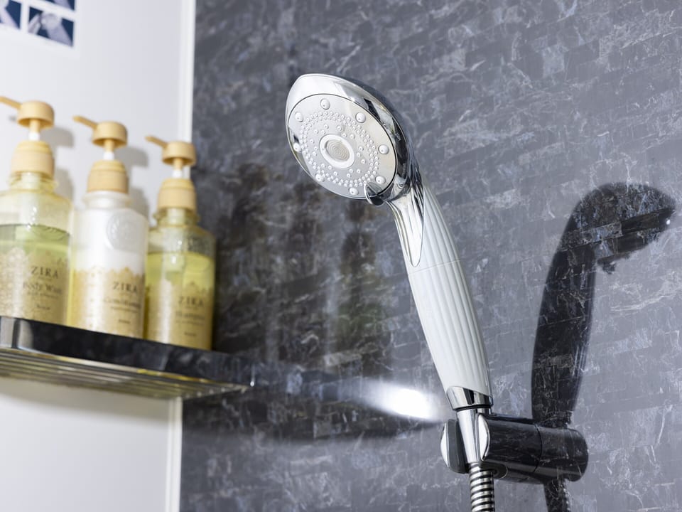 Combined shower/tub, free toiletries, hair dryer, bathrobes