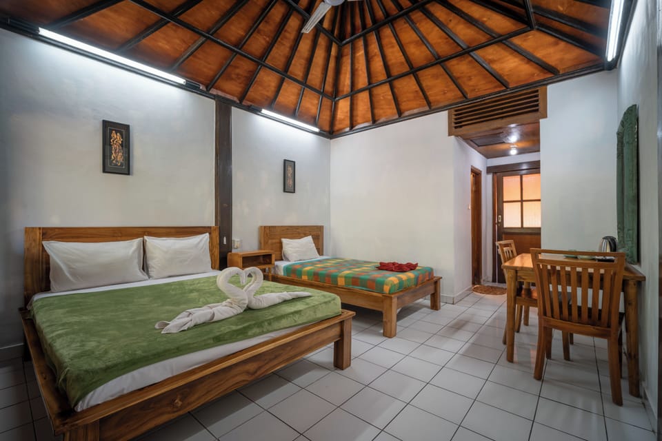 Family Room | In-room safe, desk, WiFi (free), bed sheets