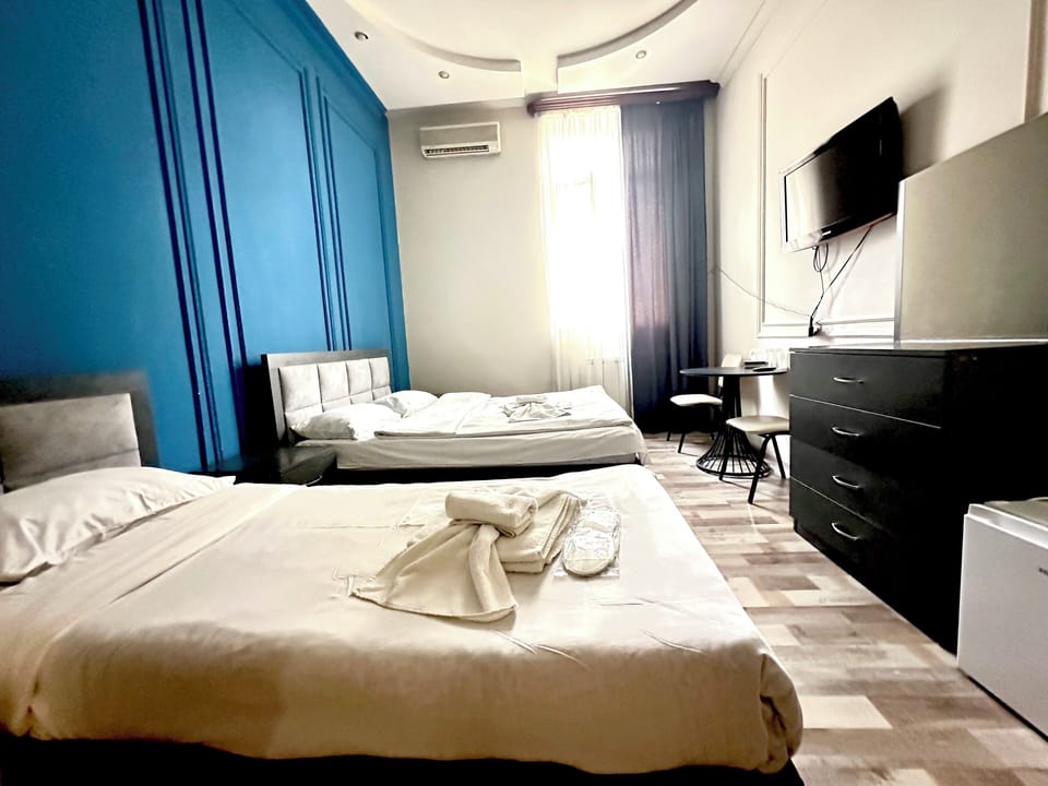 Family Quadruple Room | 1 bedroom, premium bedding, desk, laptop workspace
