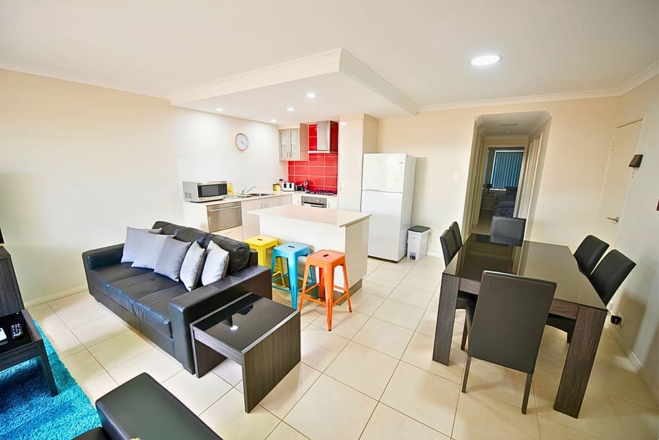 Apartment, 2 Bedrooms | Living area | 55-inch flat-screen TV with digital channels, Smart TV, Netflix