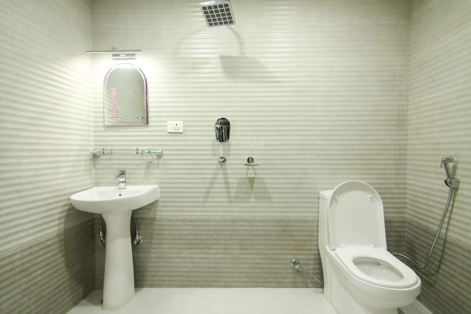 Shower, free toiletries, slippers, towels
