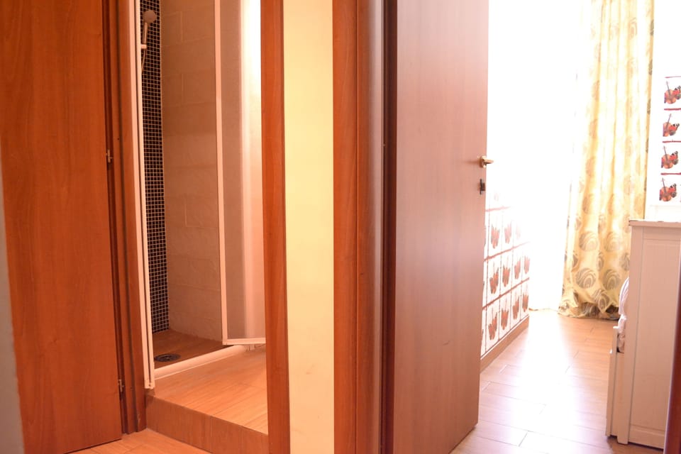 Economy Single Room, 1 Twin Bed, Private Bathroom (external) | Desk, blackout drapes, soundproofing, iron/ironing board (on request)