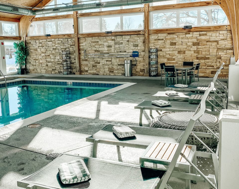 Indoor pool, open 7:00 AM to 10:00 PM, sun loungers