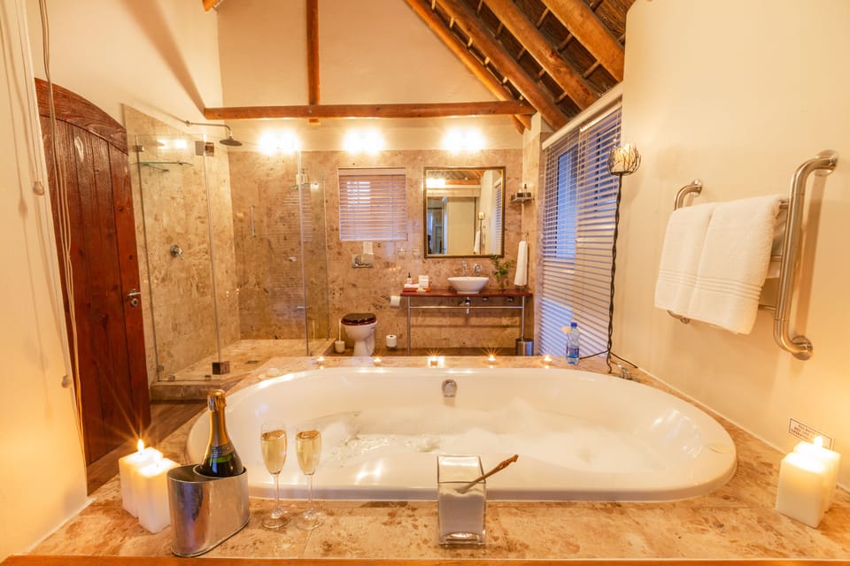 Luxury Double Room, 1 King Bed, Ocean View, Beachfront | Deep soaking bathtub