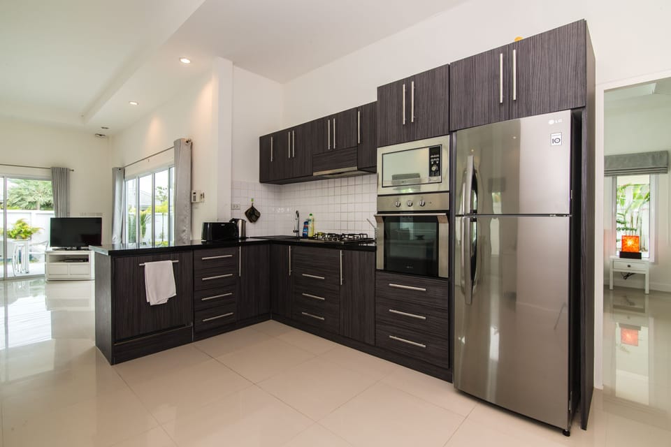 Four Bedrooms - Private Pool Villa | Private kitchen | Fridge, microwave, oven, stovetop