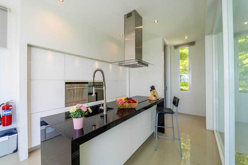 4-Bedroom Pool Villa | Private kitchen | Fridge, microwave, stovetop, dishwasher