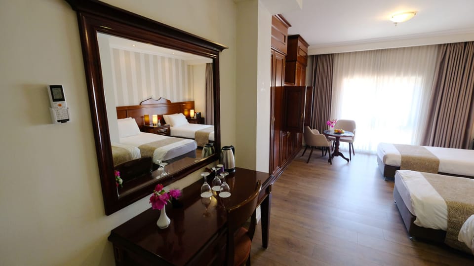 Standard Triple Room, 3 Twin Beds | In-room safe, desk, iron/ironing board, free WiFi